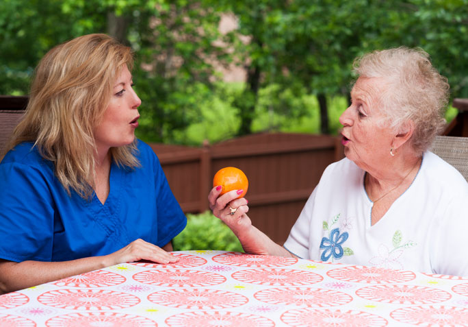 orange Nurse and Women at Wesleyan